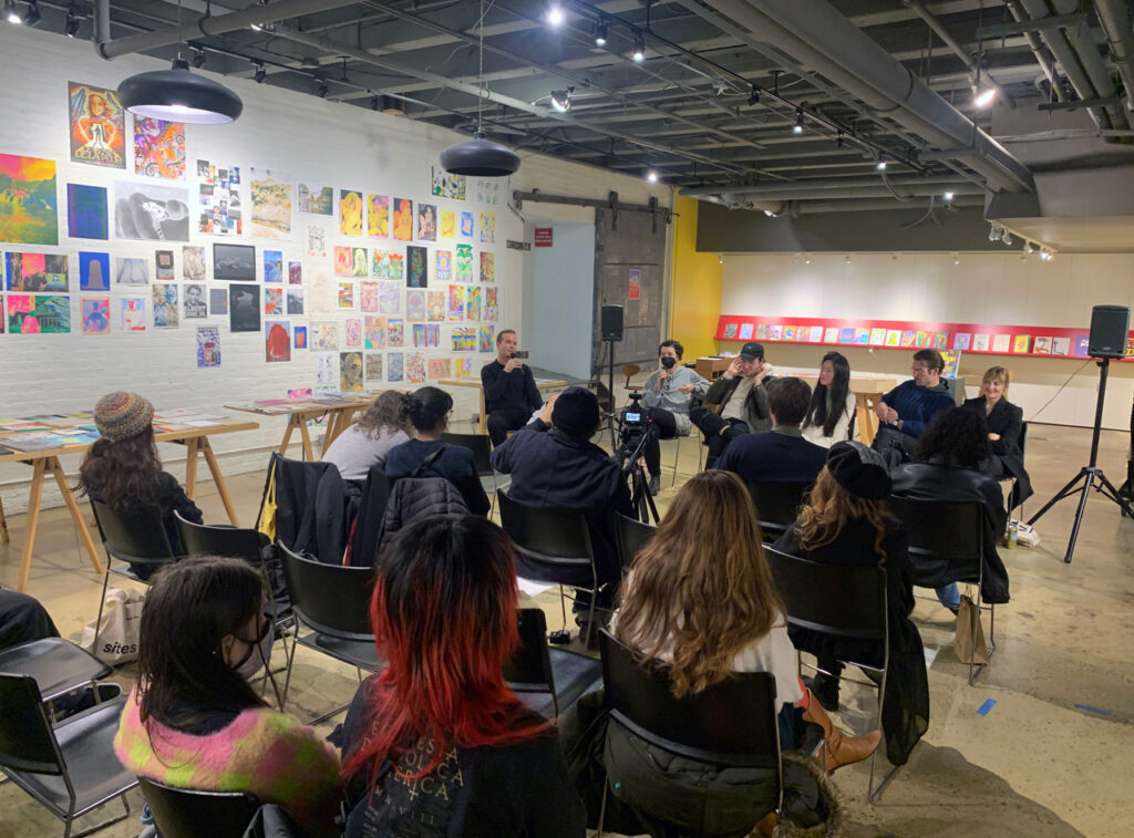 Photo of a panel discussion with Caroline Paquita-Kern, Robert Blair, Jinhee Han, Aidan Fitzgerald, and Kelli Anderson moderated by Panayiotis Terzis in the Printing the Future exhibition space.