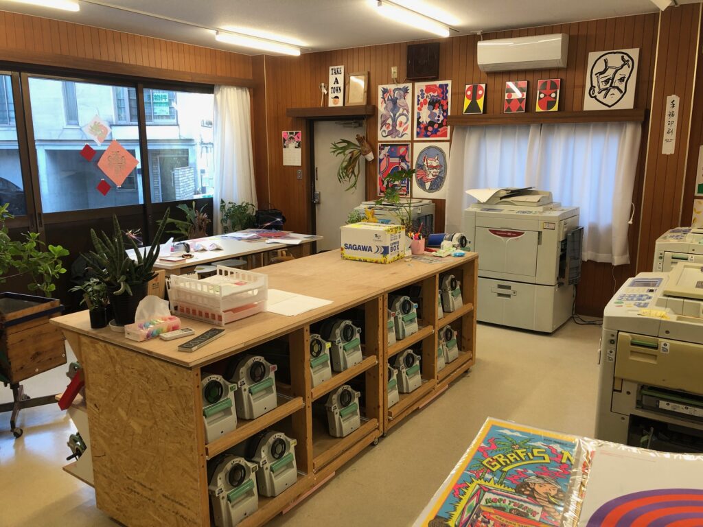 INterior studio view, showing drum storage and a Risograph duplicator